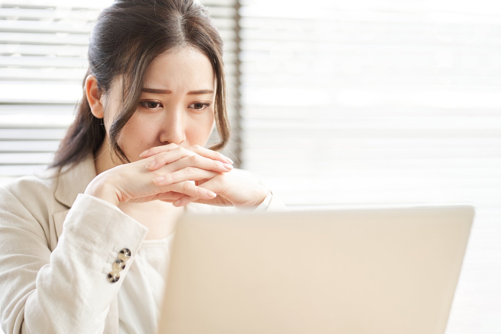 Asian woman thinking in trouble